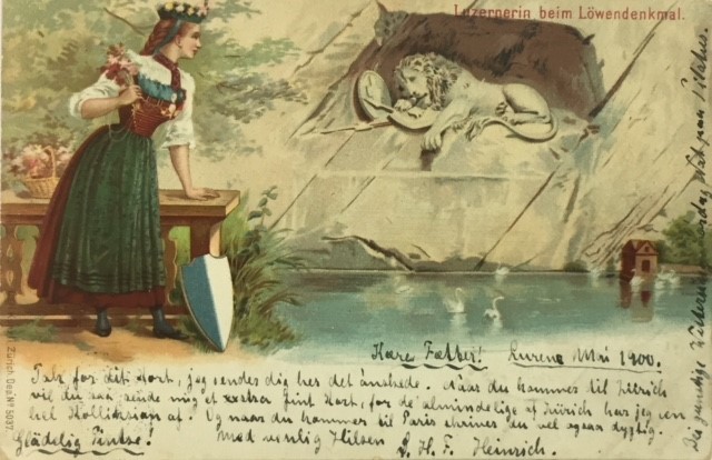 Alte Postkarte vom Löwendenkmal mit Frau in Tracht